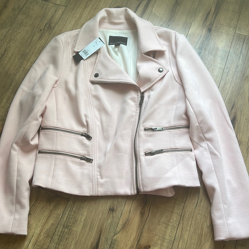 Light pink moto jacket.